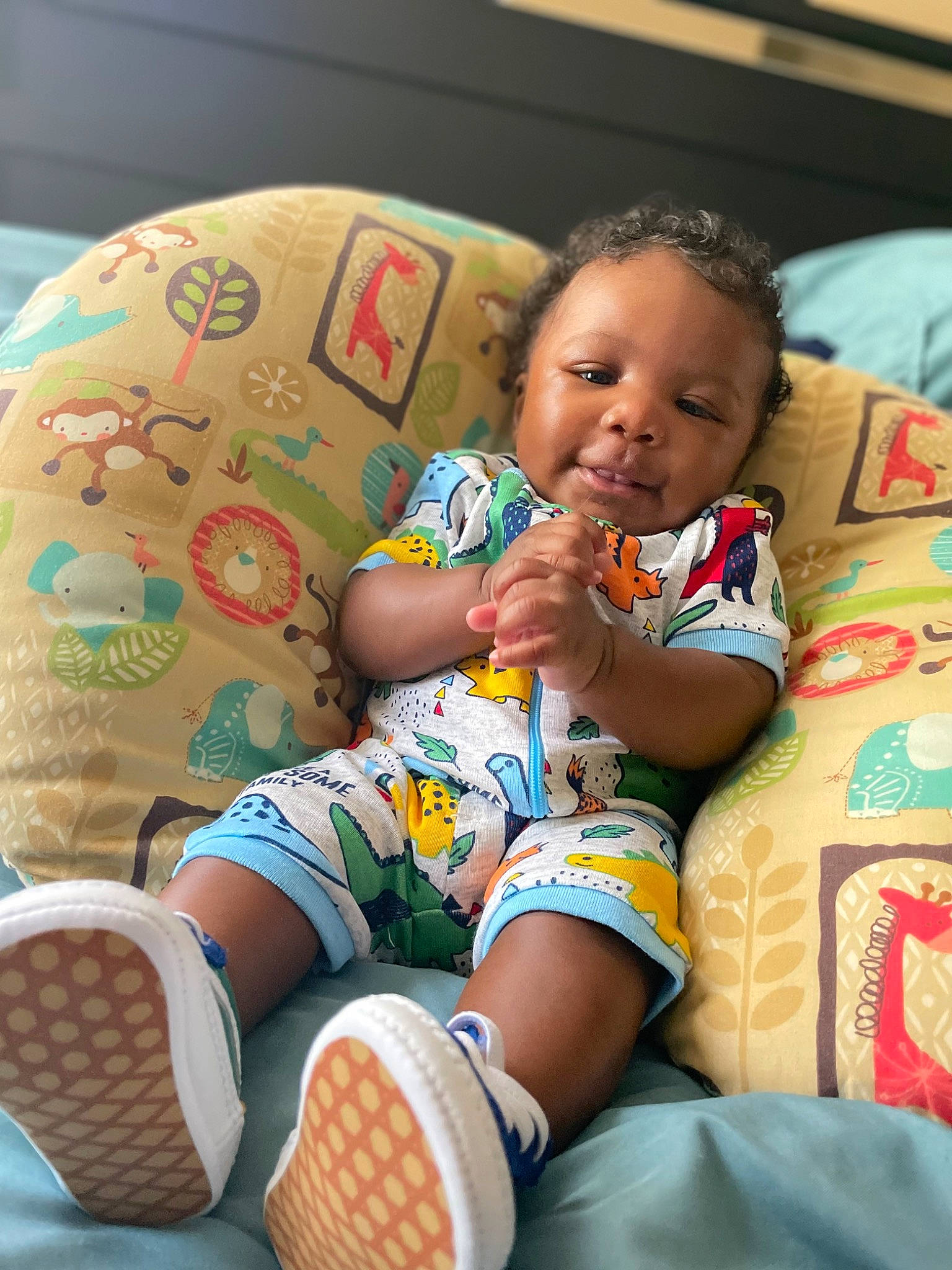Kaisen is registered to the contest to win money with this photo: baby, baby_toddler_clothing, child, comfort, face, facial_expression, finger, foot, fun, happy, human_body, human_leg, knee, lap, leg, person, skin, sock, t_shirt, thigh