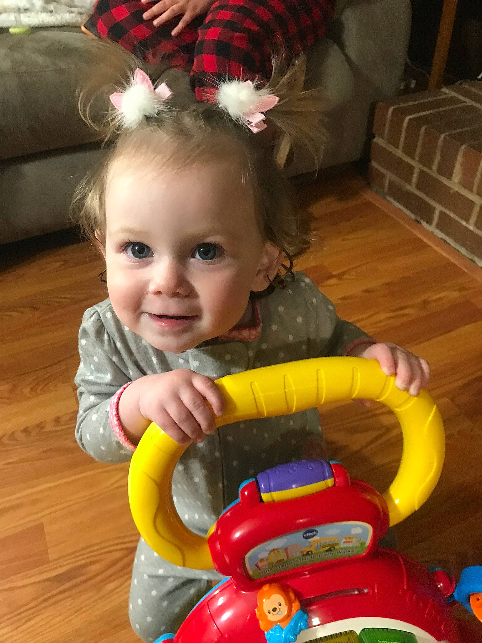 Bailey joined the competition — help win amazing prizes! baby, baby_playing_with_toys, baby_toddler_clothing, cheek, child, flooring, fun, hairstyle, happy, headband, human_body, iris, orange, organ, person, red, skin, smile, toddler, toy