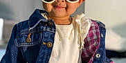 Thiare joined the competition — help win amazing prizes! toddler, child, sunglasses, denim_jacket, smile, headband, crosslegged, sitting, indoors, bed, white_socks, cute, fashion, portrait, person, happy, soft_light, casual, baby, accessory