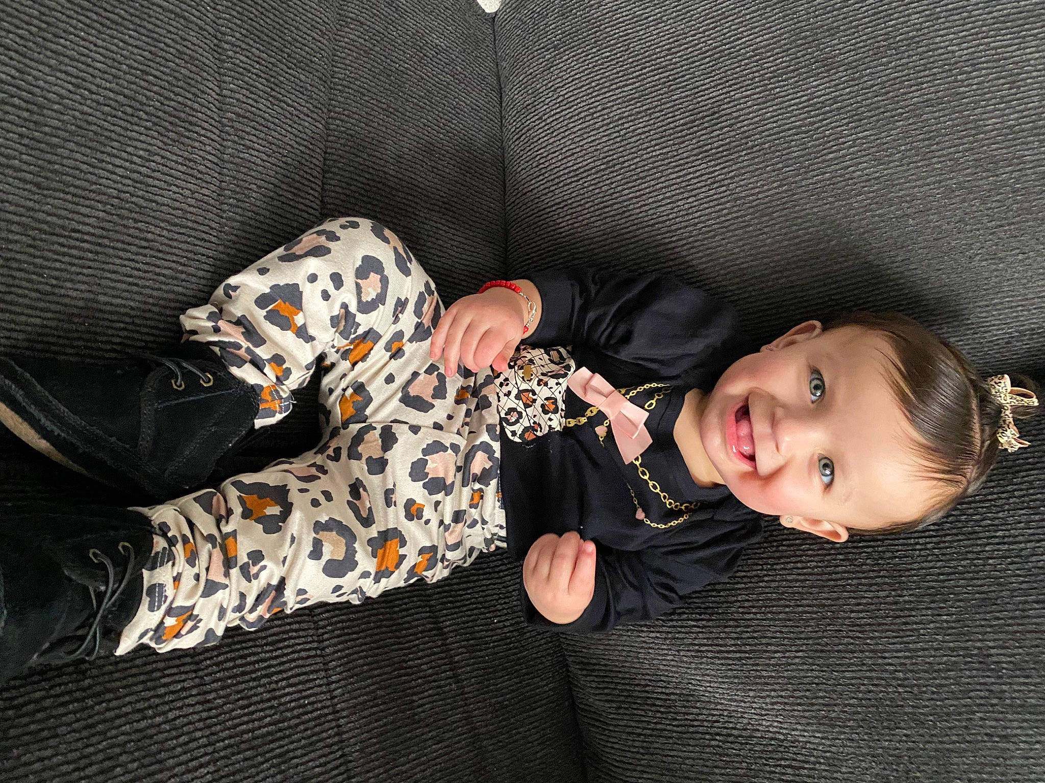 Maryjane is registered to the contest to win money with this photo: baby, baby_toddler_clothing, child, comfort, couch, flash_photography, fun, happy, human_leg, joy, knee, lap, nap, pattern, person, portrait_photography, sitting, sleeve, smile, thigh