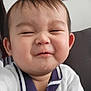Kingsley joined the competition — help win amazing prizes! toddler, child, face, expression, drool, sweater, indoor, couch, wall_art, portrait, cute, happy, person, head, clothing, smile, baby, young_child, closeup, skin