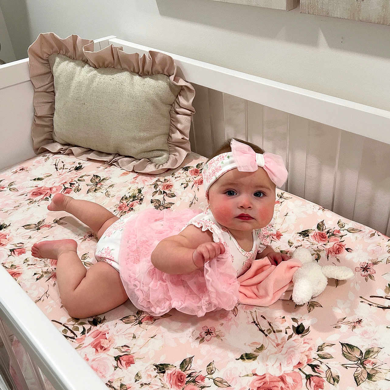 Sophia is registered to the contest to win money with this photo: baby, blanket, clothing, crib, face, furniture, hat, head, homedecor, infantbed, person