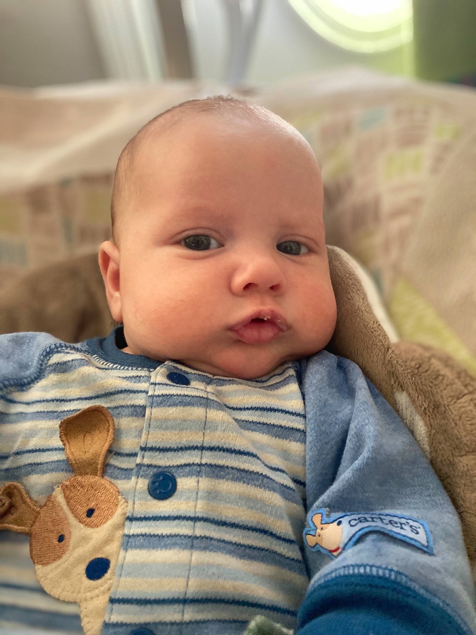 Colsen is registered to the contest to win money with this photo: baby, baby_products, cheek, child, eye, face, finger, head, nose, person, product, skin, textile, toddler