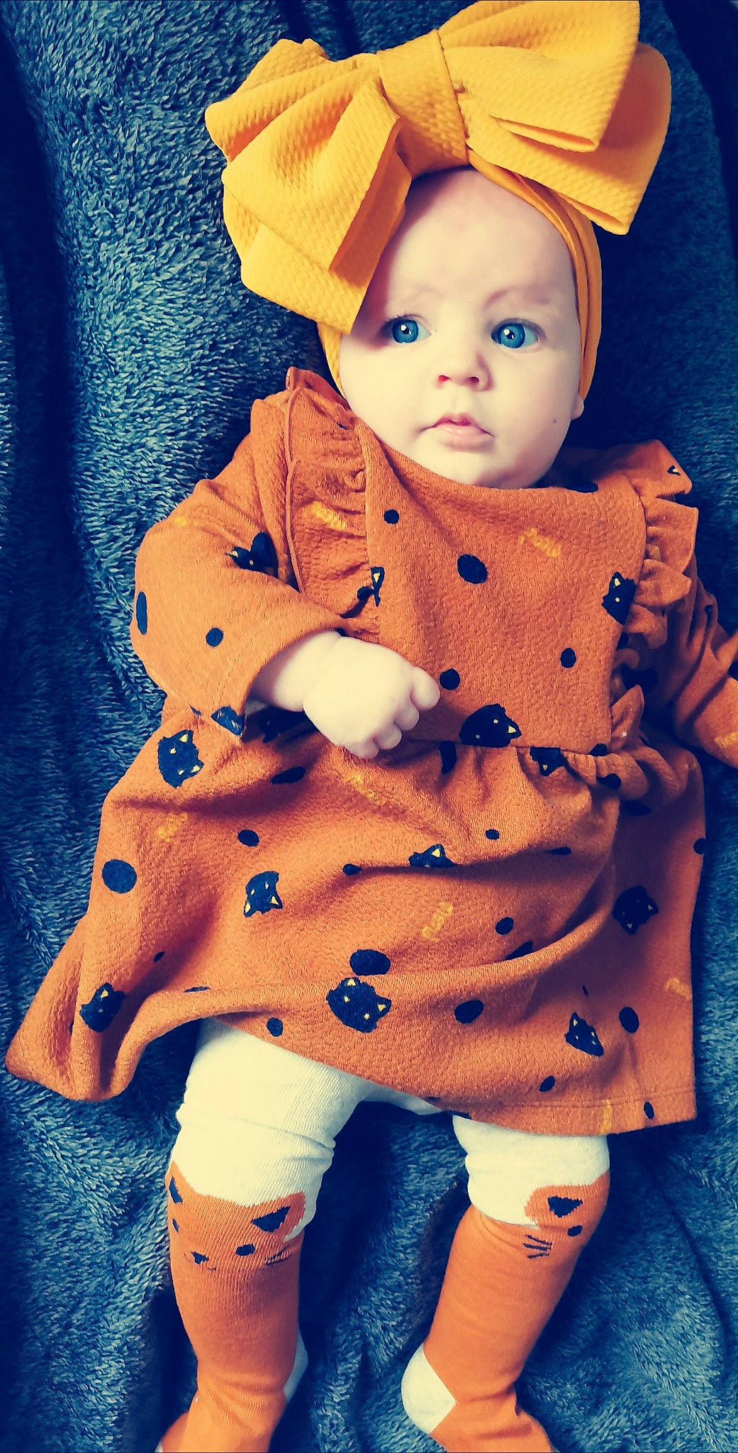 Shana a rejoint le concours — aidez-le/la à gagner de superbes lots ! arm, baby, baby_toddler_clothing, blue, cap, cheek, child, doll, electric_blue, face, orange, pattern, person, photograph, pink, skin, sleeve, textile, toddler, toy