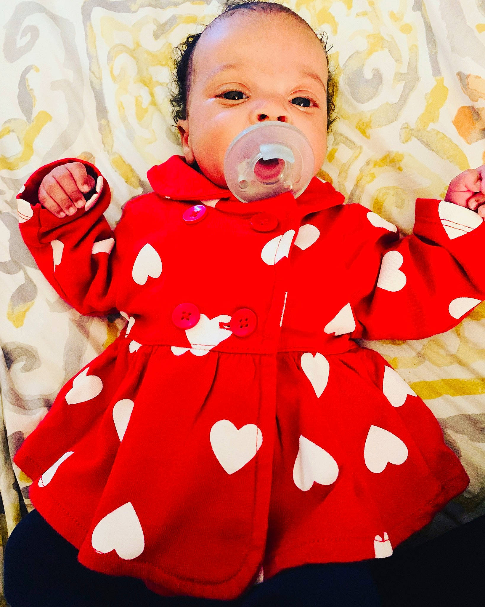 Alexandria joined the competition — help win amazing prizes! arm, baby, baby_toddler_clothing, cheek, collar, dress, eye, face, gesture, hand, happy, head, neck, outerwear, person, pink, skin, sleeve, smile, standing