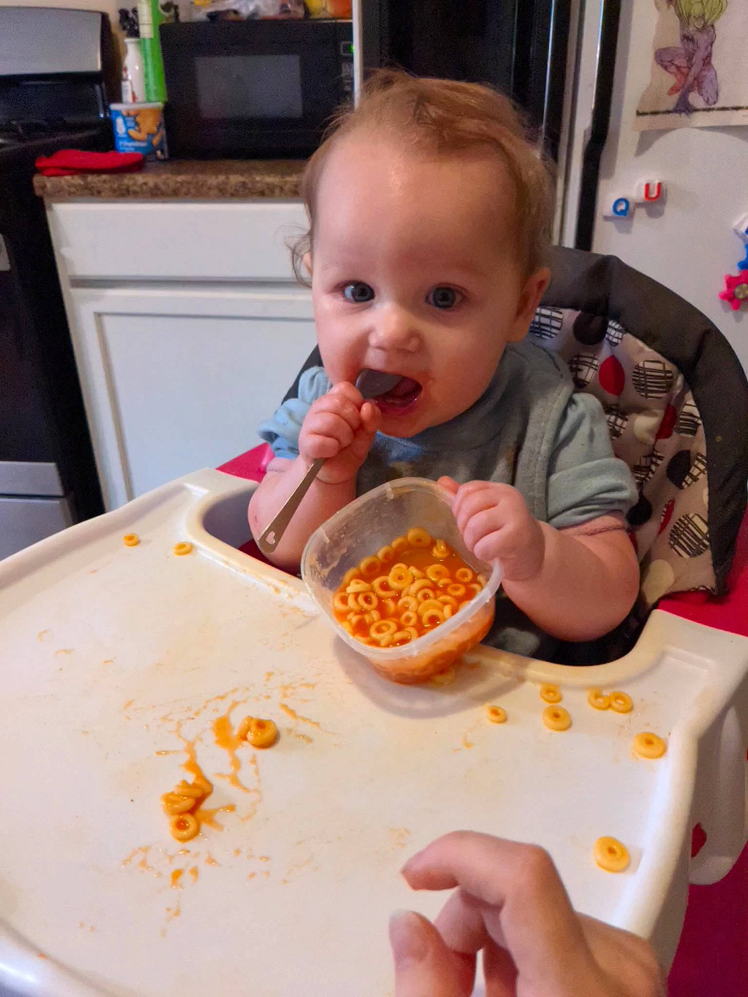 Keira joined the competition — help win amazing prizes! baby, baby_food, baby_playing_with_food, chair, child, cooking, cuisine, dish, food, food_craving, fun, head, ingredient, orange, person, recipe, t_shirt, table, tableware, toddler