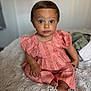 Remi is registered to the contest to win money with this photo: toddler, child, baby, portrait, dress, pink, blue_eyes, curly_hair, sitting, blanket, indoor, soft_texture, cute, innocent, young_child, person, face, expression, skin, feet