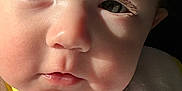 Elijah joined the competition — help win amazing prizes! baby, bodypart, bonnet, clothing, face, frown, happy, hat, head, mouth, newborn, person, photography, portrait, quilt, sad, skin, smile, spitting