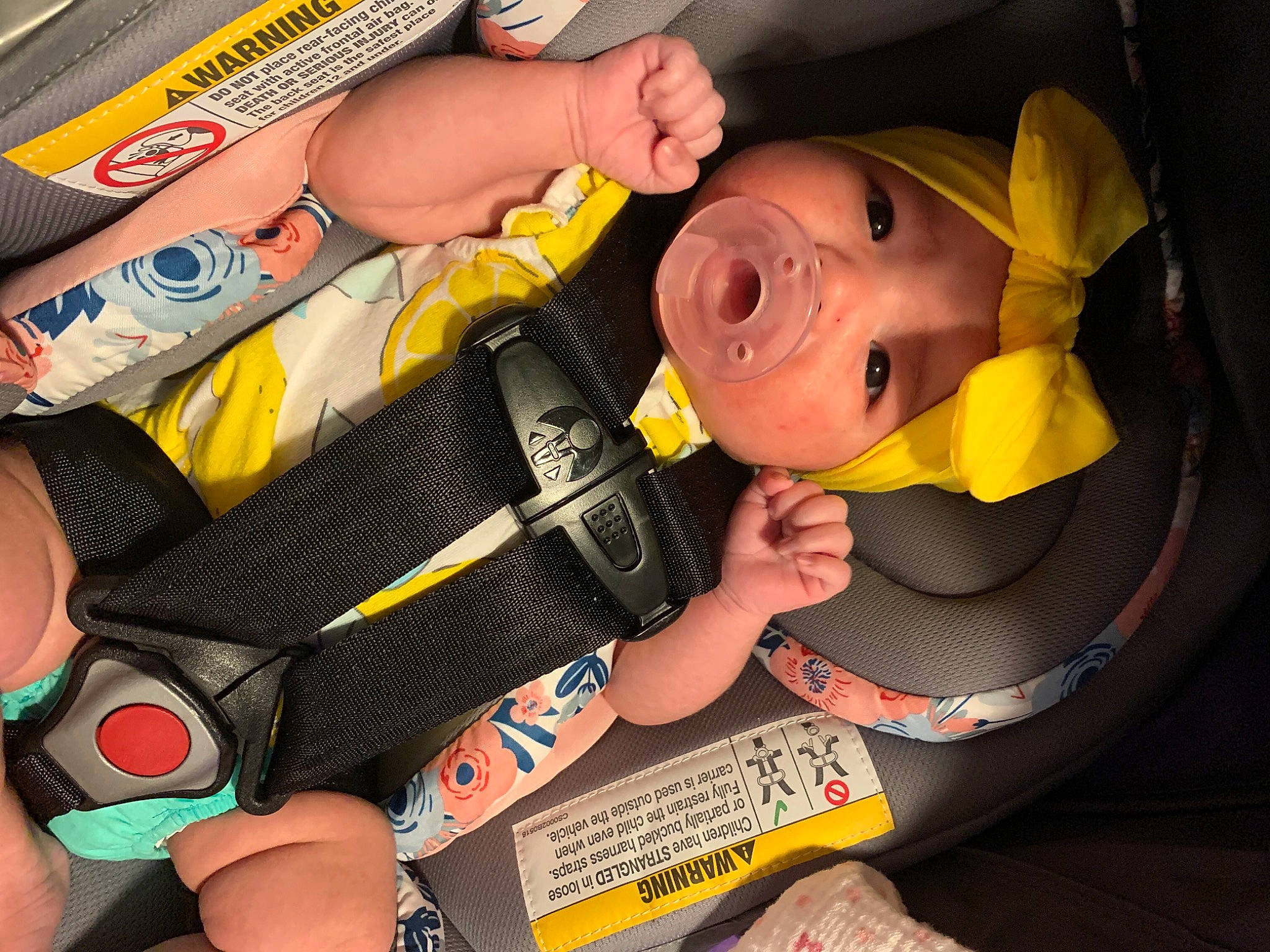 Maddie joined the competition — help win amazing prizes! auto_part, baby, baby_products, car_seat, child, cool, fashion_accessory, finger, fun, gesture, hand, happy, mouth, nail, person, personal_protective_equipment, smile, thumb, toddler, toy