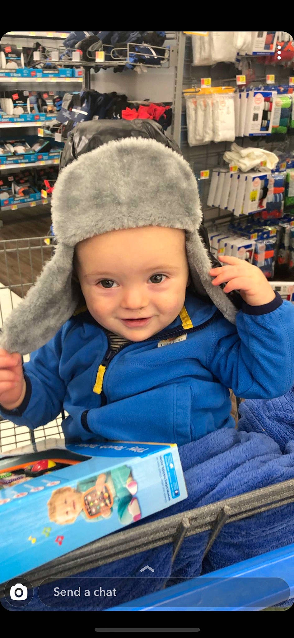 Callan is registered to the contest to win money with this photo: baby, beanie, cap, child, headgear, person, play, product, toddler, toy