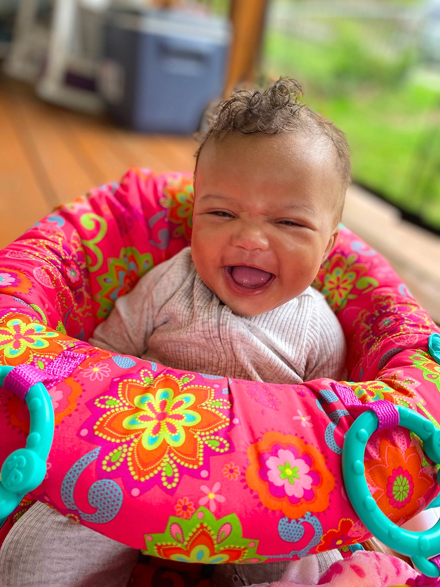 Malani is registered to the contest to win money with this photo: baby, baby_toddler_clothing, child, chin, event, eye, face, facial_expression, fun, grass, happy, head, human_body, leisure, person, pink, recreation, sitting, skin, smile