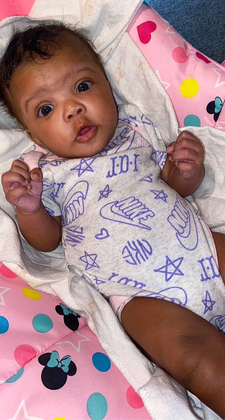 Malani joined the competition — help win amazing prizes! arm, baby_toddler_clothing, black, cheek, eye, face, facial_expression, happy, head, iris, lip, mouth, nose, person, pink, purple, skin, sleeve, smile, textile