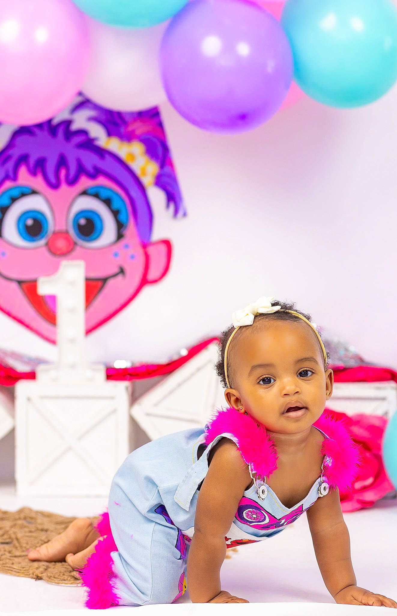 Mila is registered to the contest to win money with this photo: baby_toddler_clothing, balloon, beauty, blue, child, design, event, facial_expression, fun, happy, leisure, magenta, party_supply, person, pink, product, purple, thigh, toddler, violet