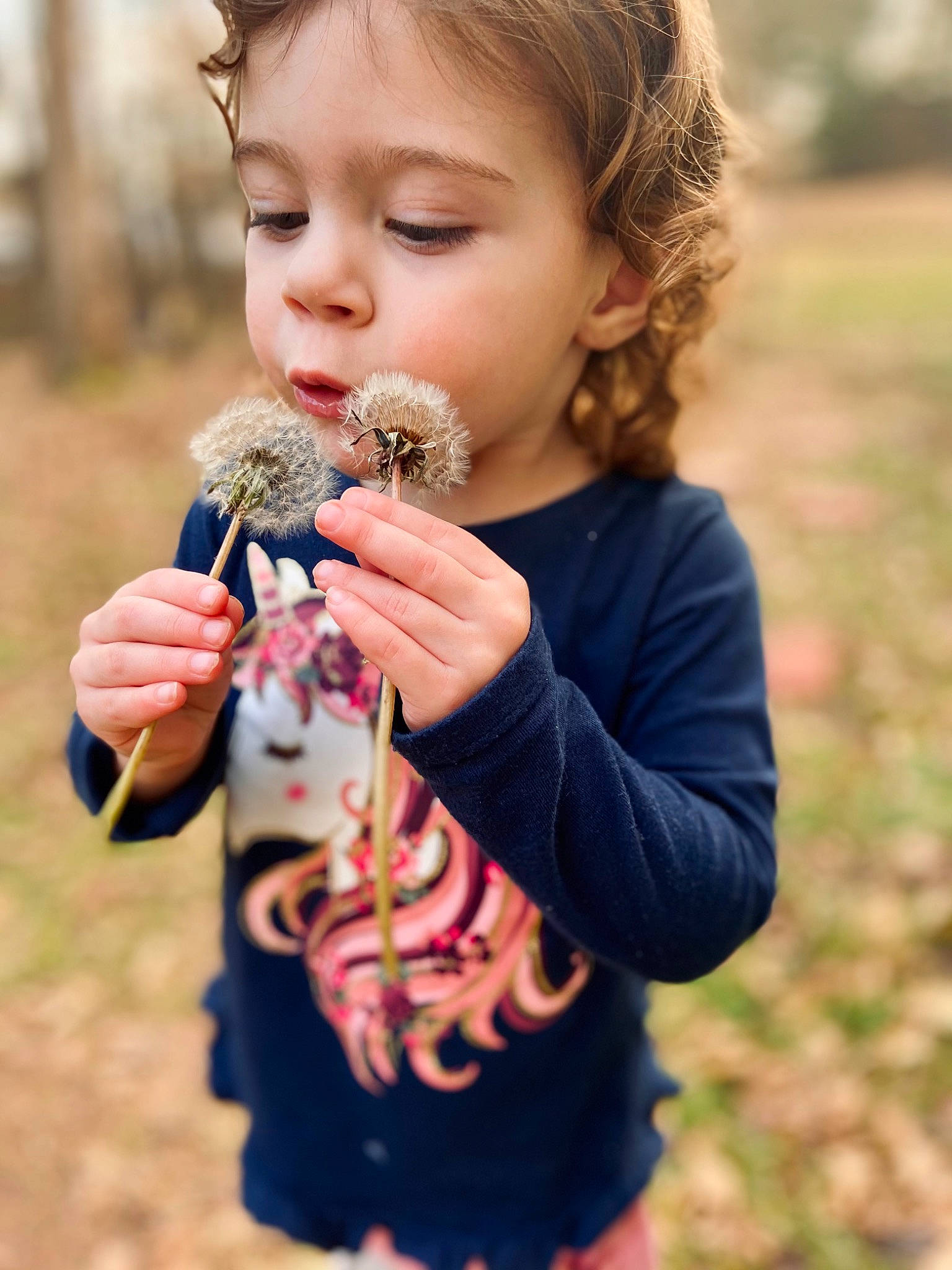Joanna is registered to the contest to win money with this photo: baby_toddler_clothing, blond, child, doll, eyelash, finger, fun, gesture, grass, happy, nail, nose, pattern, people_in_nature, person, plant, play, pollinator, portrait_photography, soil