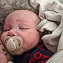 baby, sleeping, pacifier, blanket, closeup, infant, face, soft, cozy, child, toddler, clothing, red, blue, skin, hand, tattoo, comfort, rest, peaceful