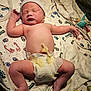 Dakota is registered to the contest to win money with this photo: newborn, baby, diaper, umbilical_clamp, hospital, medical_equipment, blanket, footprints, cap, sleeping, infant, person, skin, human, lying_down, healthcare, newborn_baby, cute, toddler, child