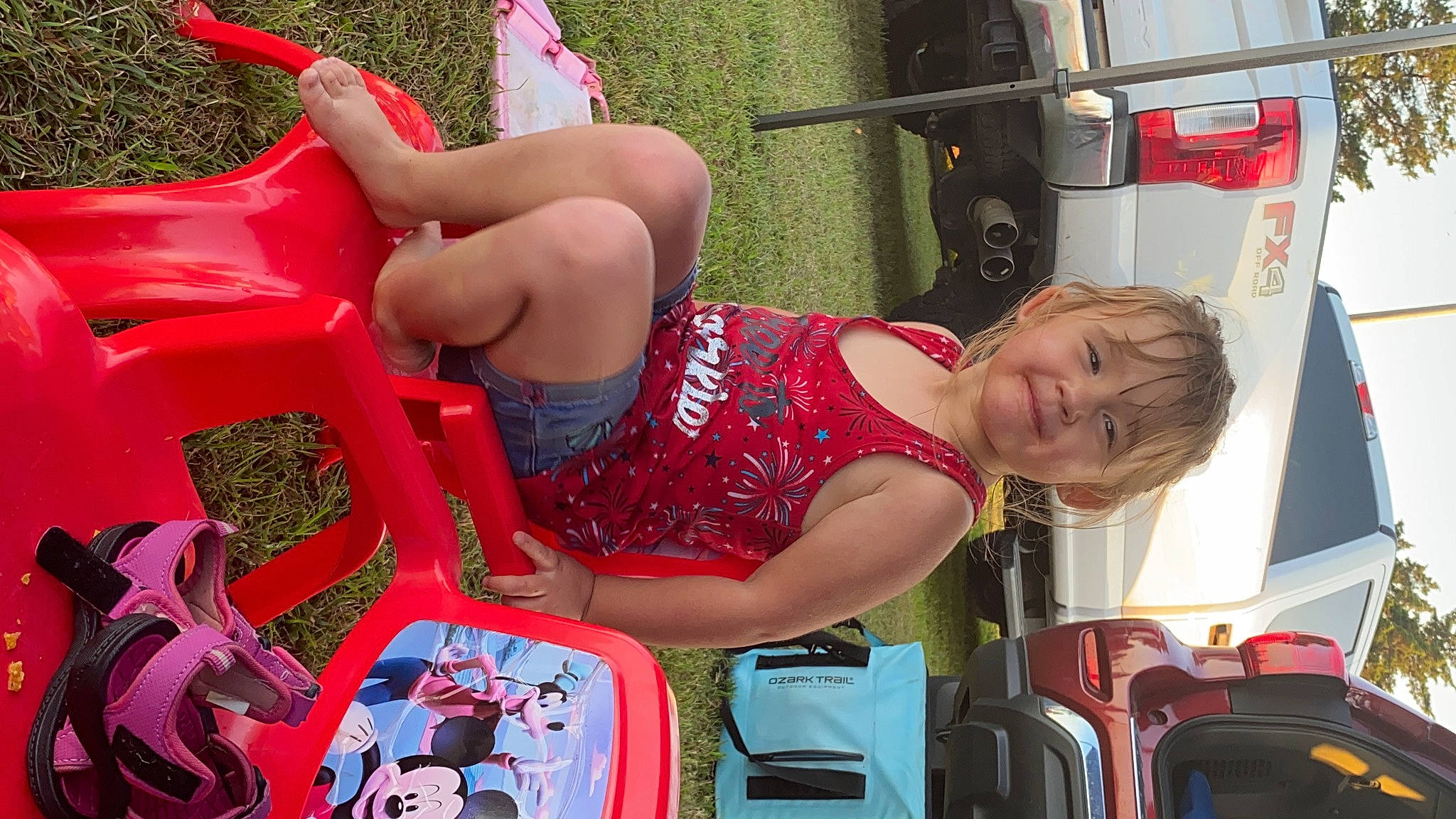 Summer joined the competition — help win amazing prizes! automotive_design, automotive_exterior, automotive_lighting, automotive_tail_brake_light, car, chair, fun, human_leg, joint, joy, leg, motor_vehicle, person, pink, red, sandal, smile, thigh, tire, toddler