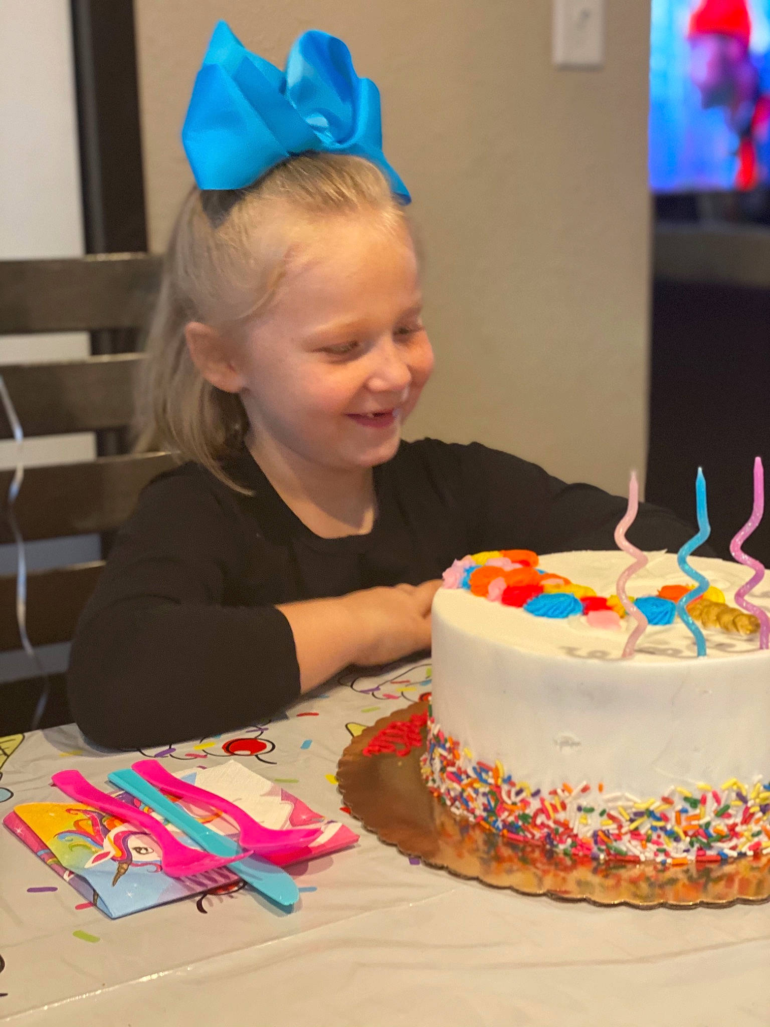 Loretta is registered to the contest to win money with this photo: birthday, birthday_cake, birthday_party, blue, cake, cake_decorating, cake_decorating_supply, candle, child, cuisine, event, face, food, fun, hat, joy, party_supply, person, smile, sugar_cake