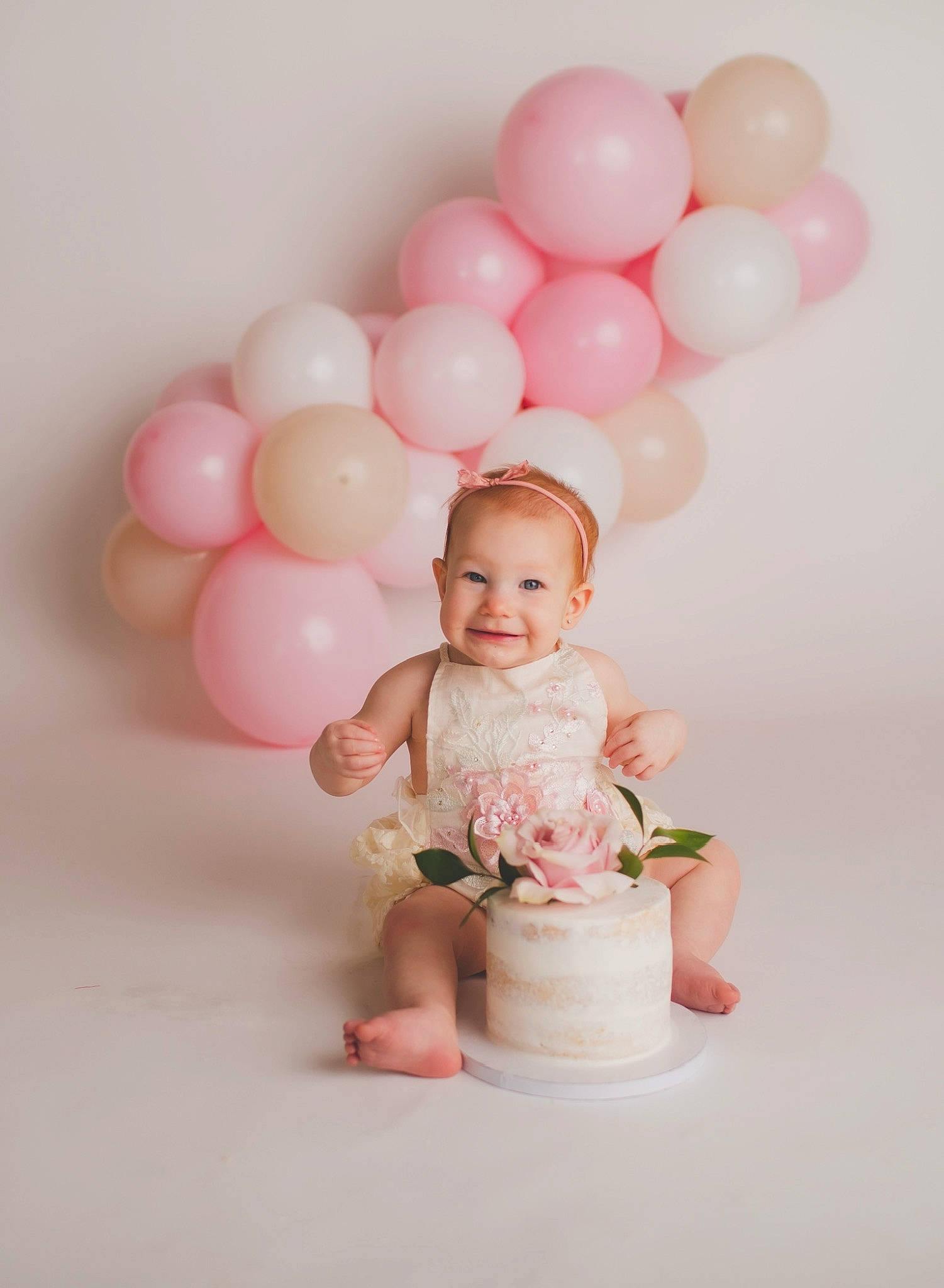 Ophelia is registered to the contest to win money with this photo: baby, baby_toddler_clothing, balloon, child, dress, event, flash_photography, fun, gesture, happy, head, joy, magenta, party, party_supply, pattern, peach, person, pink, smile