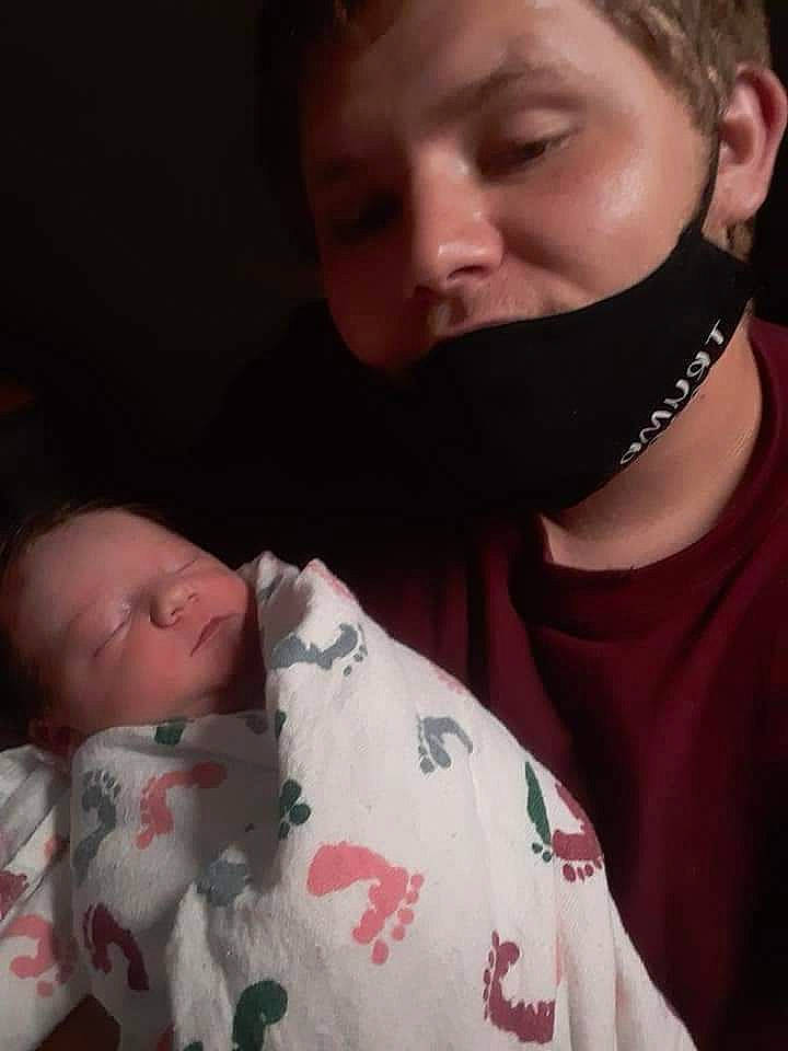 Denver is registered to the contest to win money with this photo: baby, cheek, chin, comfort, ear, eyebrow, eyelash, facial_expression, finger, forehead, gesture, human_body, iris, jaw, lip, mouth, neck, nose, person, skin