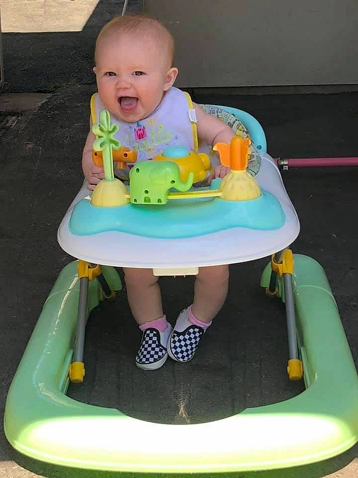 Ellie joined the competition — help win amazing prizes! baby, baby_products, baby_toddler_clothing, baby_toys, bib, cake_decorating, child, fun, green, happy, icing, leisure, person, photograph, pink, play, sitting, smile, sweetness, toddler