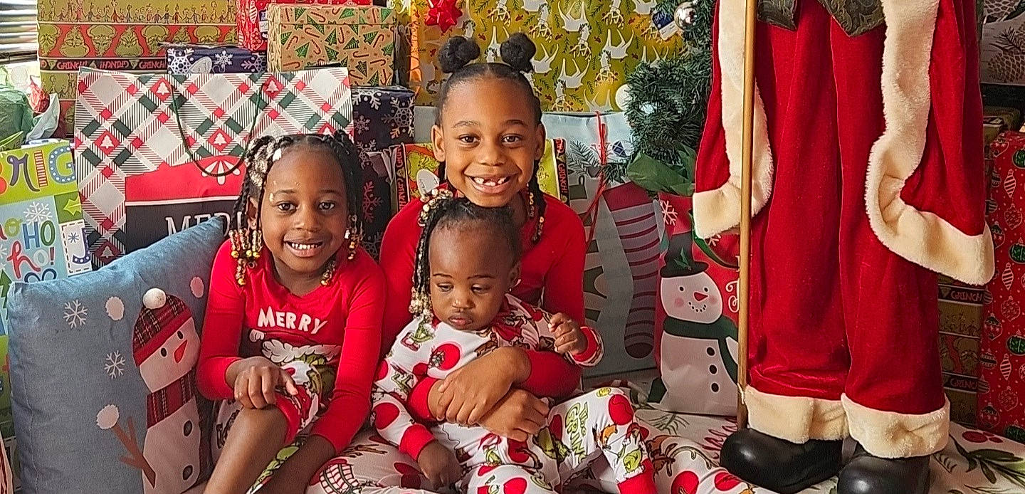 Kinsley is registered to the contest to win money with this photo: baby, child, christmas_decoration, christmas_ornament, curtain, decoration, event, fun, happy, holiday, jewellery, joy, ornament, pattern, person, red, room, smile, sock, t_shirt