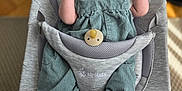 Ellie joined the competition — help win amazing prizes! baby, smiling, infant, child, green_outfit, corduroy, ergobaby, baby_seat, indoor, happy, cute, person, small_hands, feet, face, expression, comfort, seated, light, cozy