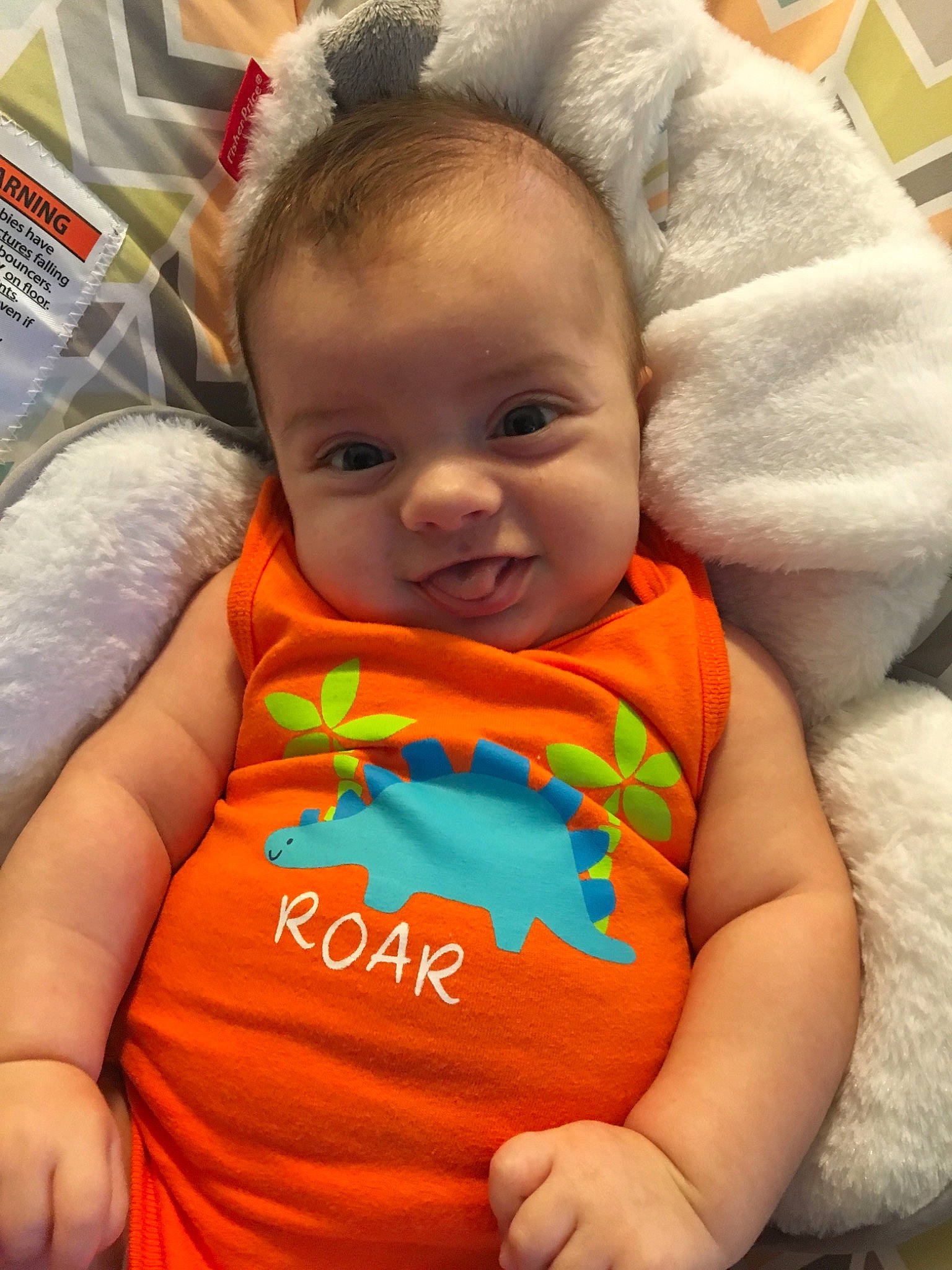 Covan is registered to the contest to win money with this photo: baby, baby_toddler_clothing, cheek, child, eye, face, head, iris, lip, nose, orange, person, skin, smile, toddler