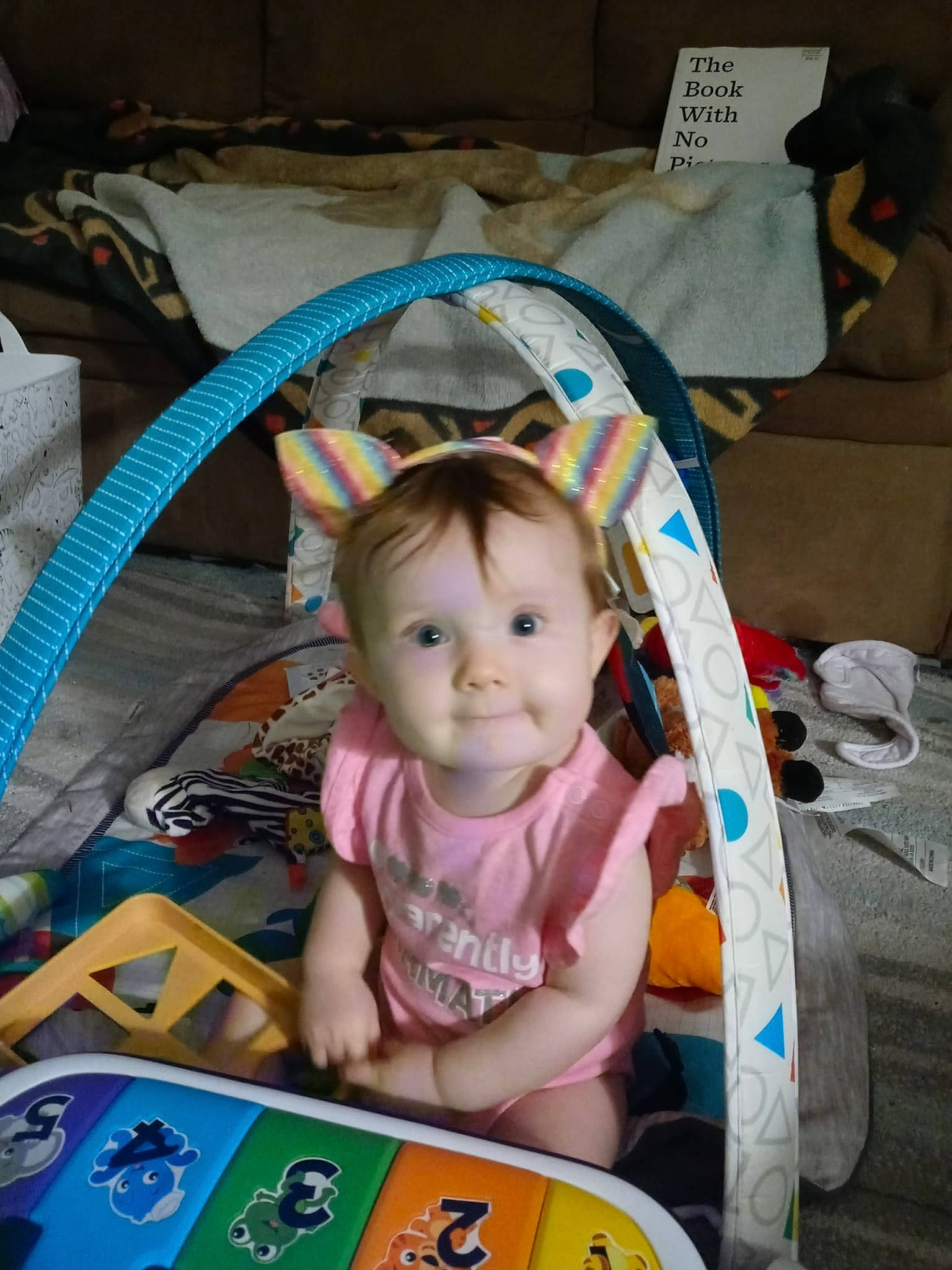 Lily joined the competition — help win amazing prizes! baby, baby_carriage, baby_products, baby_toddler_clothing, baby_toys, cheek, child, comfort, eye, fun, head, infant_bed, iris, person, play, product, room, sitting, smile, toddler