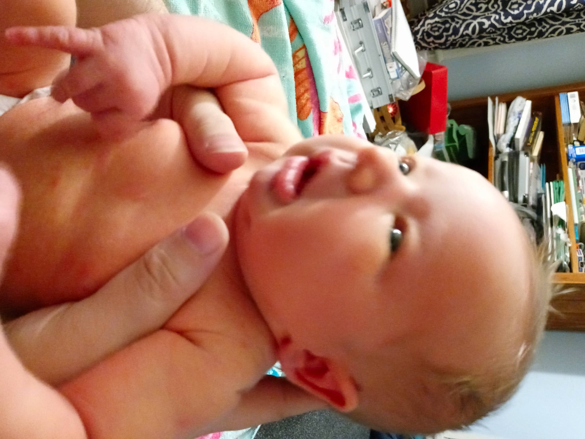 Grey is registered to the contest to win money with this photo: cheek, chest, chin, ear, eye, eyebrow, eyelash, finger, gesture, hand, head, human_body, joint, lip, mouth, nail, neck, nose, person, skin