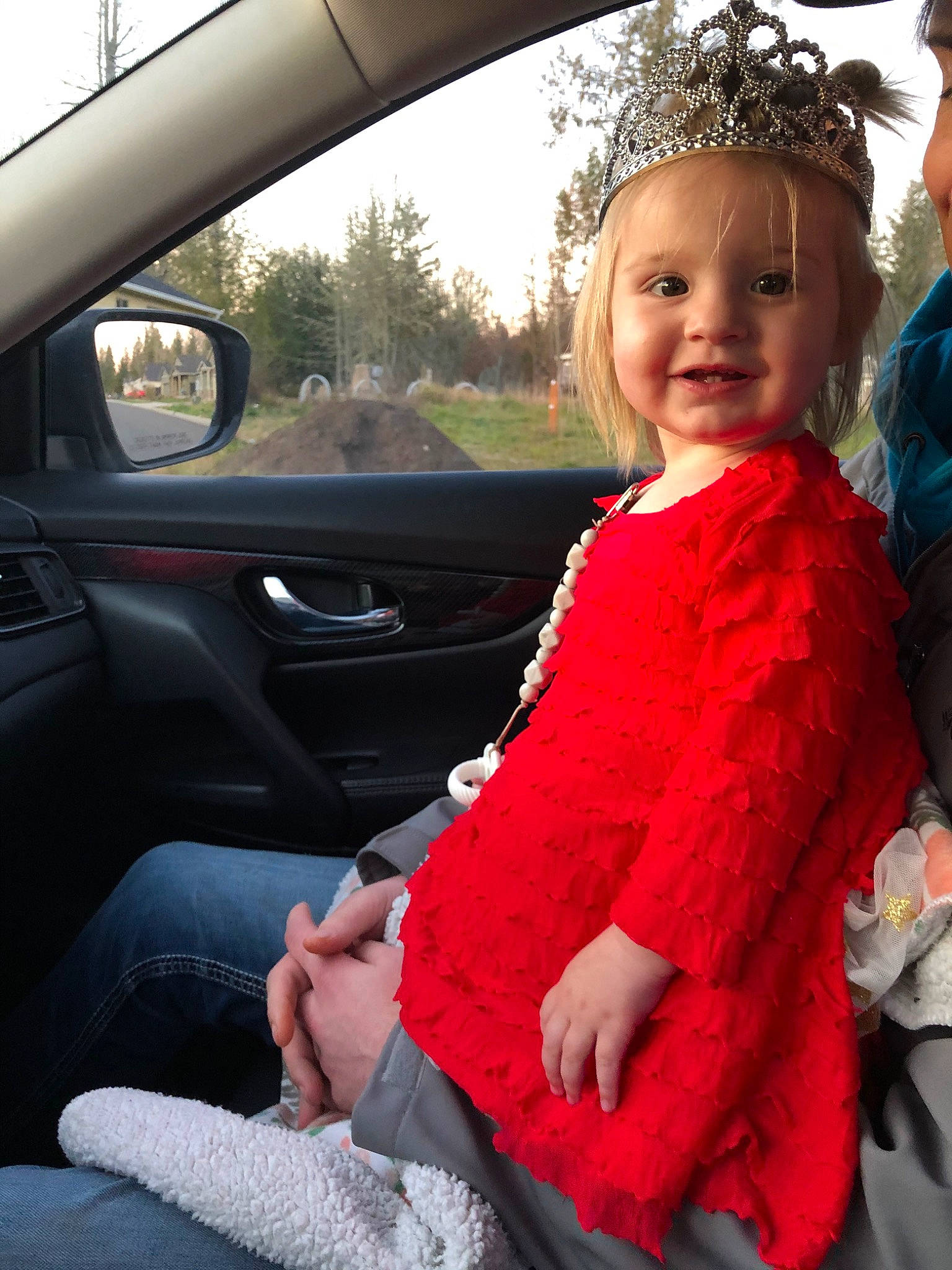Remy is registered to the contest to win money with this photo: auto_part, car, car_seat, car_seat_cover, child, driving, family_car, luxury_vehicle, outerwear, person, seat_belt, steering_wheel, toddler, vehicle, vehicle_door