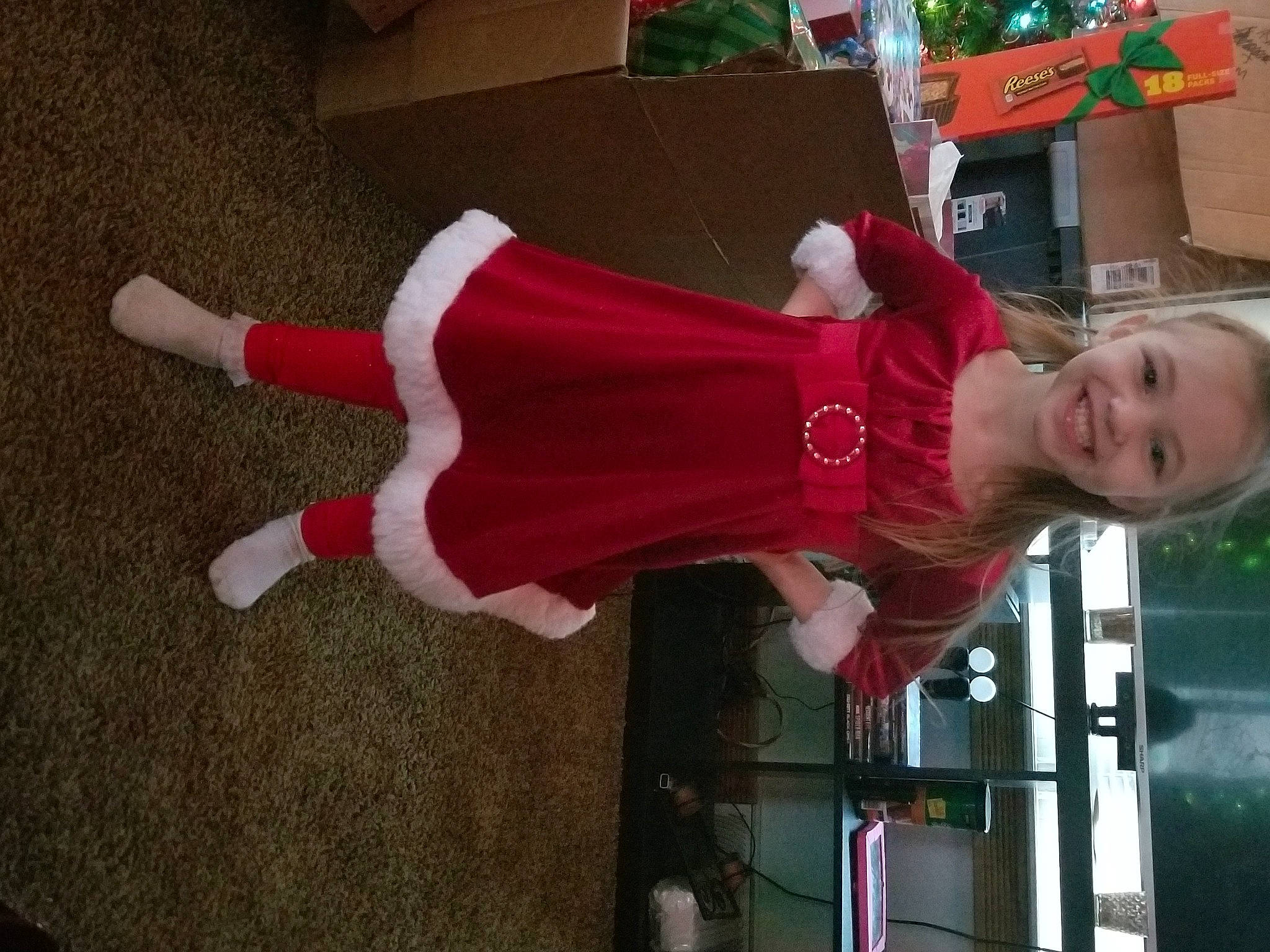 Aubriella joined the competition — help win amazing prizes! balance, carmine, costume, door, event, face, fictional_character, flooring, fun, holiday, human_leg, joy, person, plant, red, smile, sock, sportswear, thigh, tree