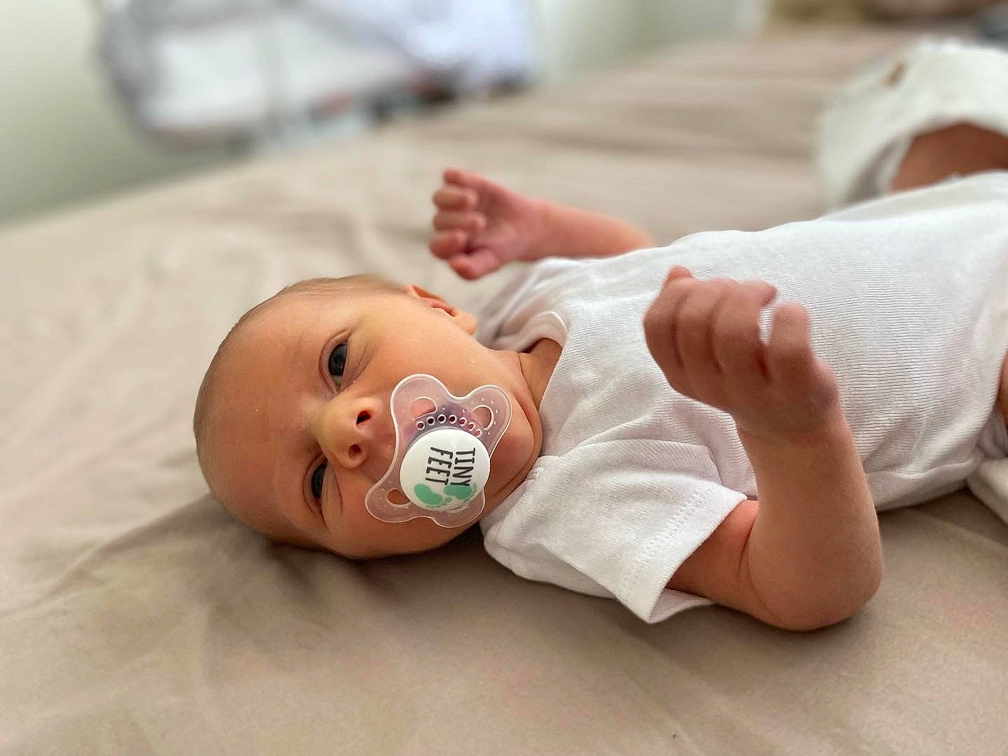 Andrew is registered to the contest to win money with this photo: baby, baby_products, baby_safety, baby_toddler_clothing, cheek, child, chin, comfort, eye, face, finger, gesture, human_body, linens, nail, nose, person, room, skin, thumb
