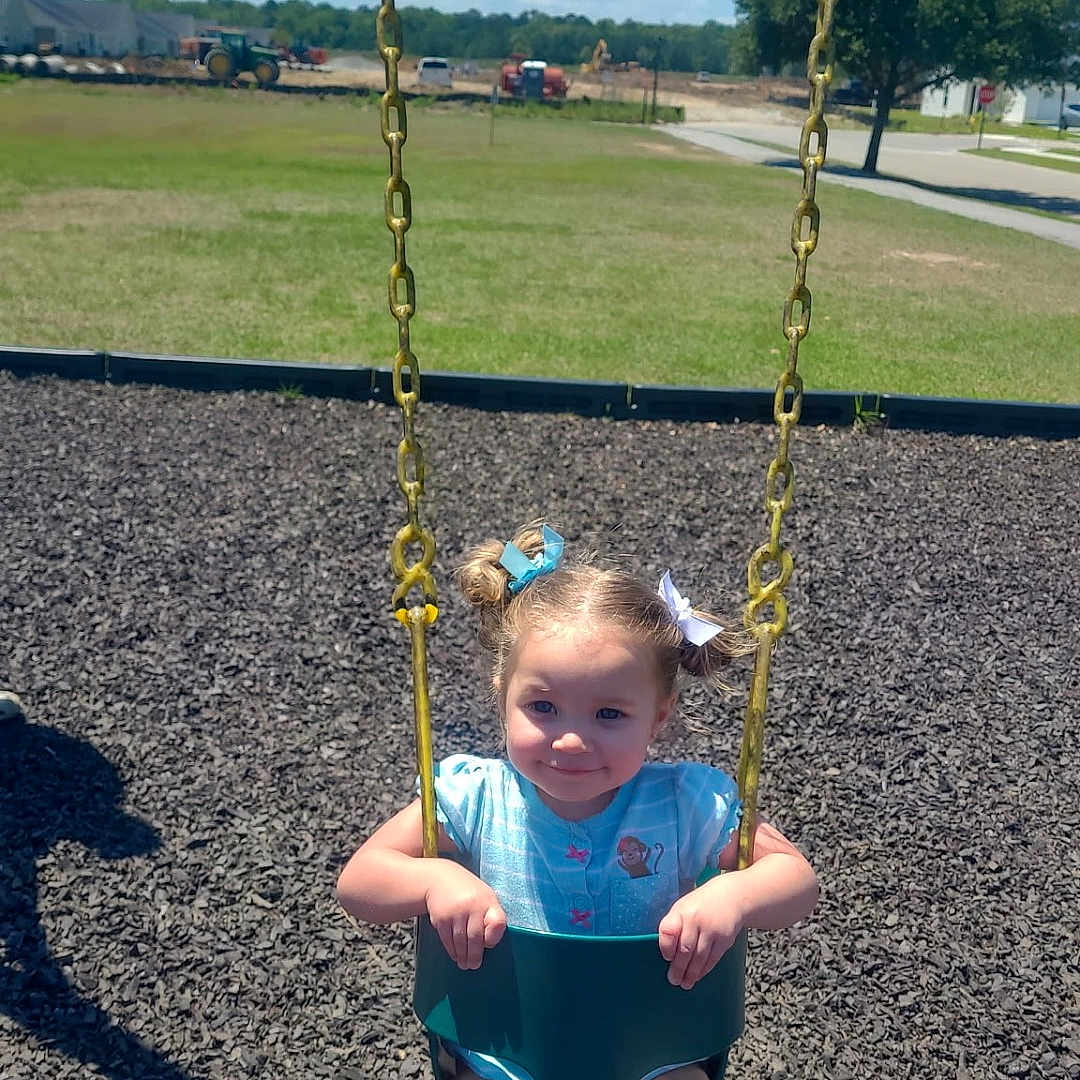 Zoelle joined the competition — help win amazing prizes! toddler, child, swing, playground, outdoor, sunny, grass, blue_sky, chains, smiling, pigtails, shoes, summer, daytime, park, happy, young_girl, play, casual_clothing, recreation