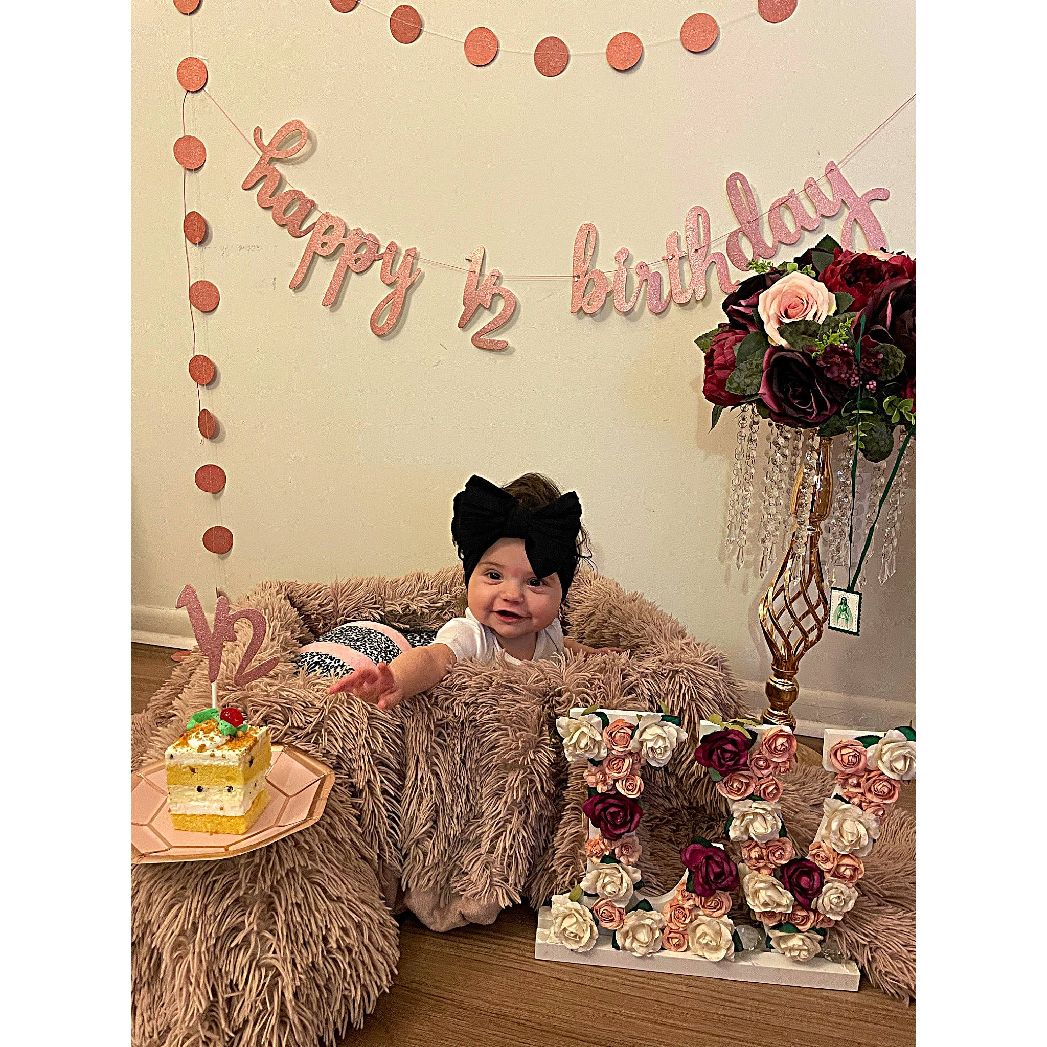 Lucianna joined the competition — help win amazing prizes! fashion_accessory, flooring, floral_design, flower, font, fur, happy, hat, headwear, linens, magenta, paper_product, pattern, peach, person, rectangle, room, sitting, sleeve, table