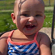 Ariyah joined the competition — help win amazing prizes! baby, child, smiling, outdoor, sunlight, swing, clothing, striped, face, happy, grass, nature, shadow, portrait, cute, infant, summer, play, baby_clothes, daylight