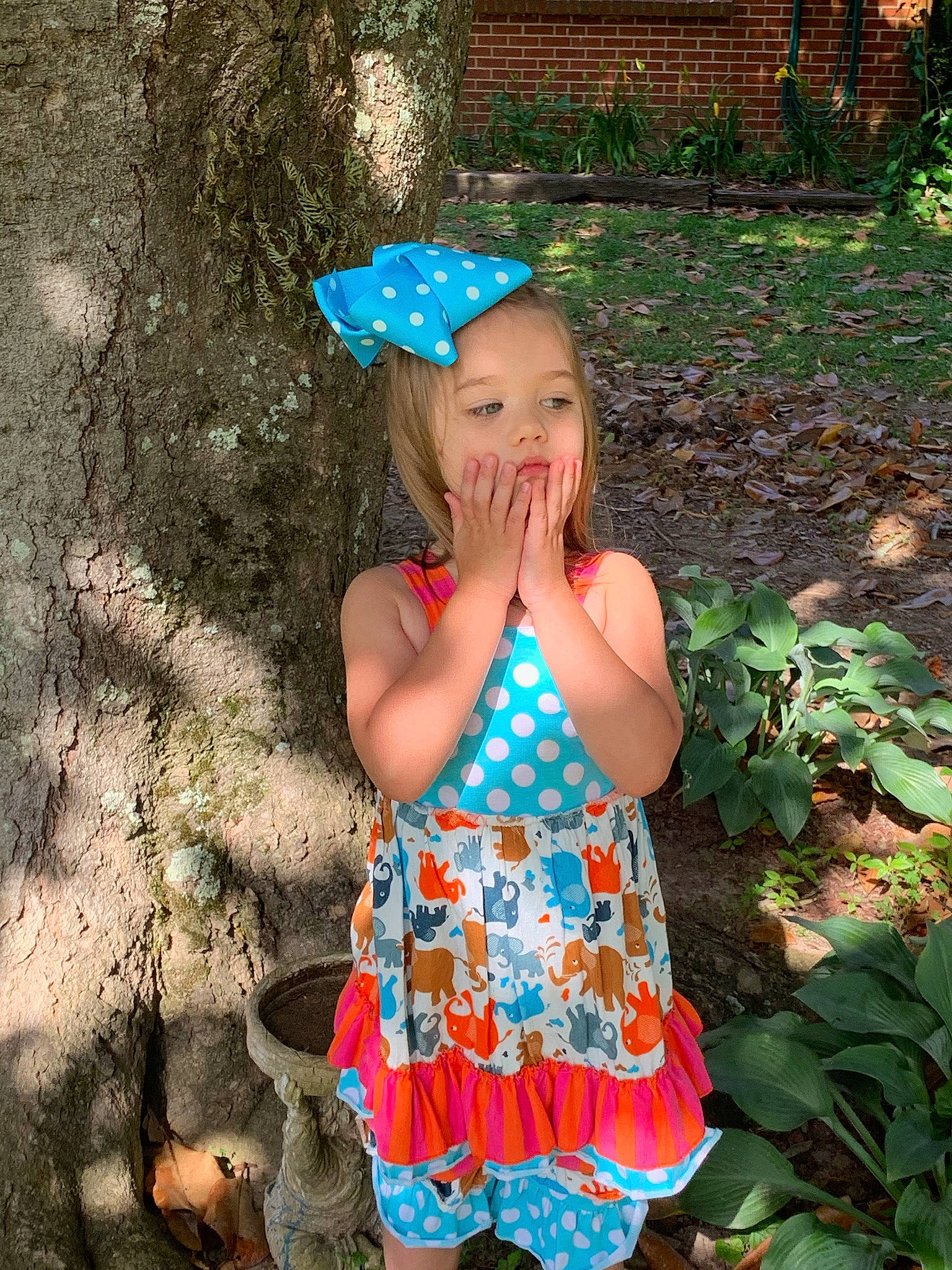 Aryanna is registered to the contest to win money with this photo: adaptation, baby_toddler_clothing, child, day_dress, dress, electric_blue, fashion_accessory, fun, grass, happy, hat, human_leg, nature, pattern, people_in_nature, person, plant, soil, spring, summer