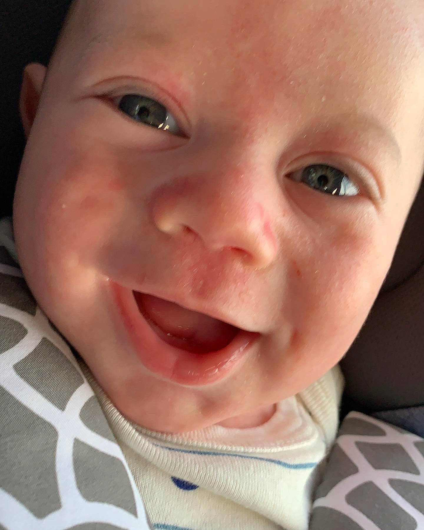 Ezra joined the competition — help win amazing prizes! baby, baby_toddler_clothing, blond, cheek, close_up, ear, eye, eyebrow, eyelash, happy, iris, jaw, lip, mouth, nose, person, skin, sleeve, smile, toddler