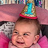 Amarosa joined the competition — help win amazing prizes! baby, smiling, party_hat, pink_clothing, bib, tulle, earring, face, cheeks, indoor, birthday, celebration, streamers, colorful, pom_pom, closeup, happy, child, infant, portrait