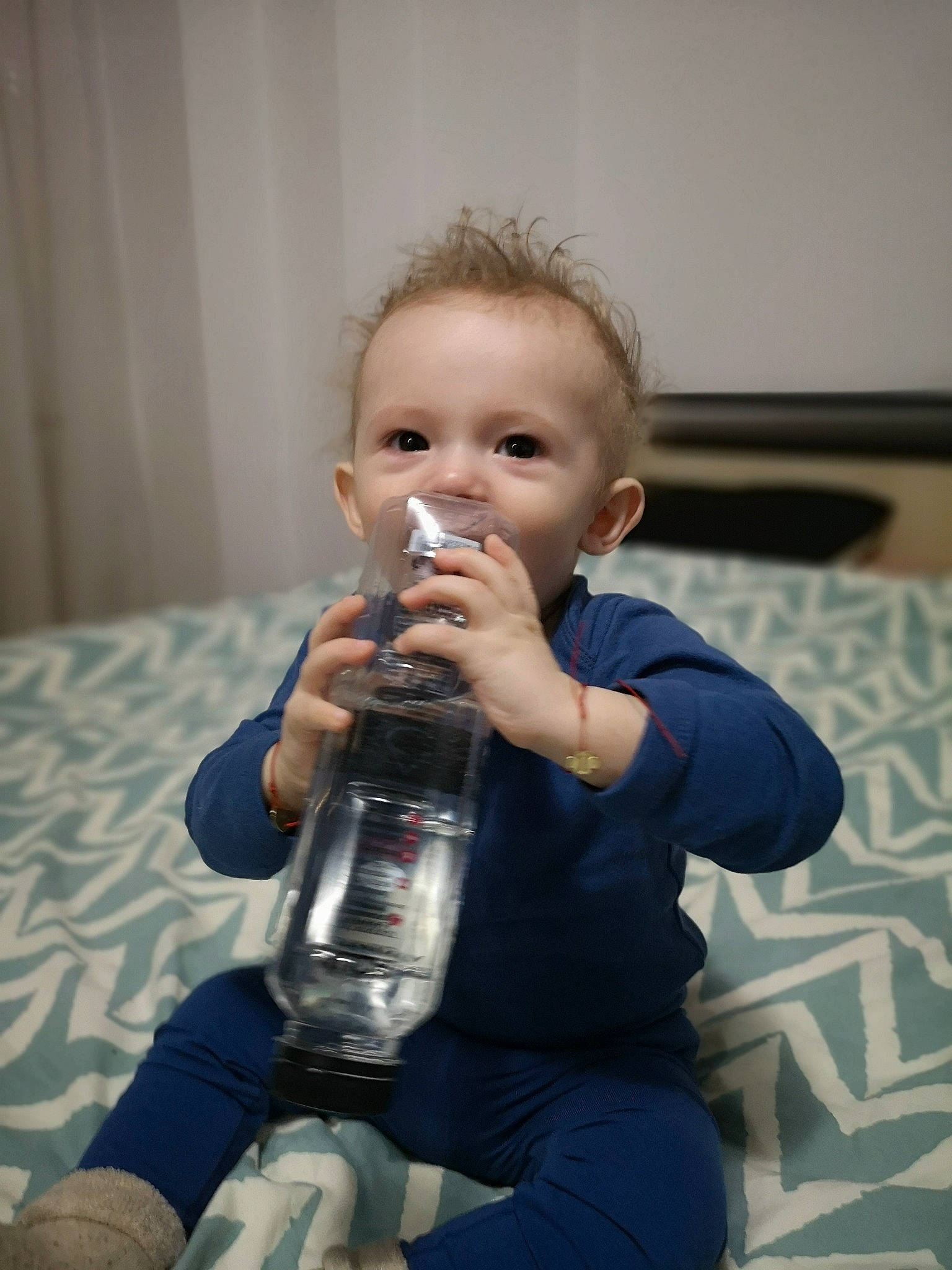 Carol joined the competition — help win amazing prizes! arm, baby, child, comfort, drink, drinkware, event, finger, flooring, fun, hand, human_body, musical_instrument, nail, person, reed_instrument, sitting, skin, toddler, wind_instrument