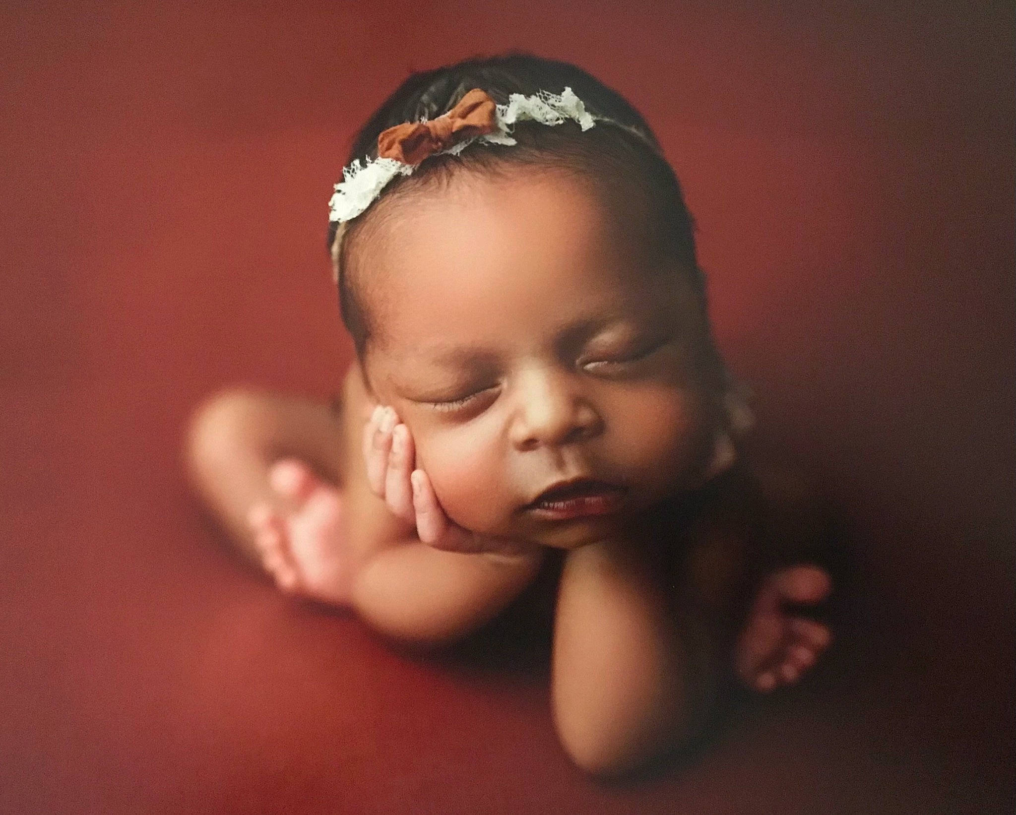 Cienna is registered to the contest to win money with this photo: baby, baby_toddler_clothing, black_hair, cheek, chin, ear, eyebrow, eyelash, finger, flash_photography, happy, headband, headgear, headpiece, iris, lip, nail, neck, nose, person