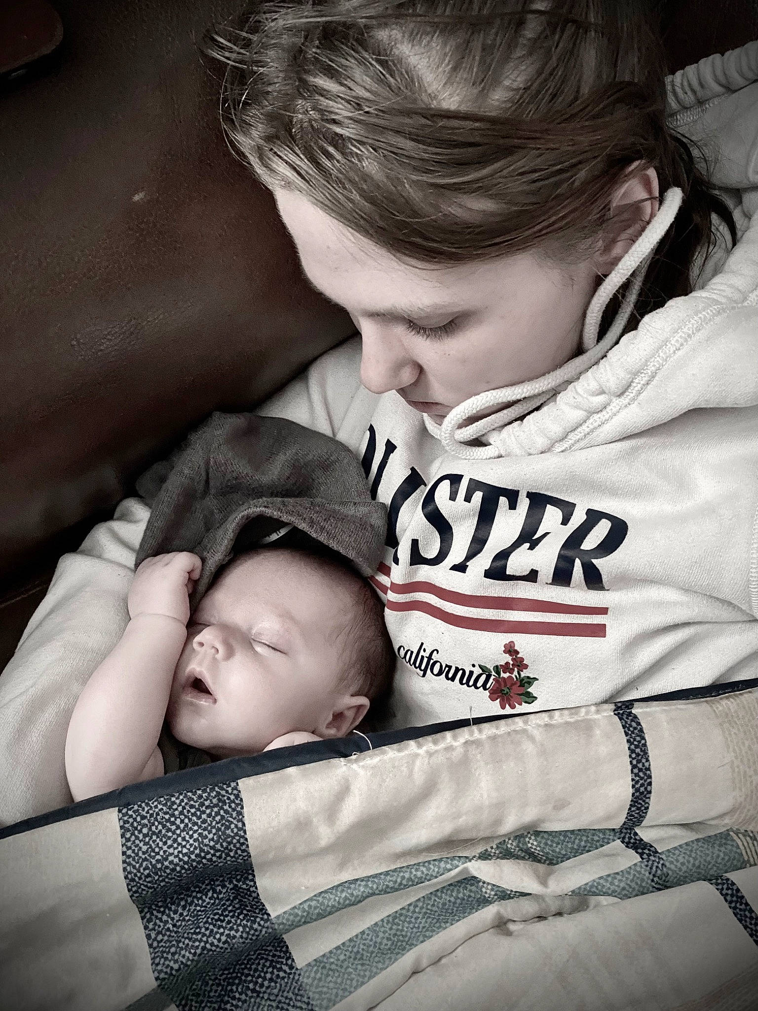 Winter is registered to the contest to win money with this photo: arm, baby, baby_products, child, comfort, cool, face, facial_expression, flash_photography, gesture, hair, hairstyle, hand, happy, monochrome, monochrome_photography, nose, person, sitting, skin