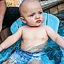 Rocky joined the competition — help win amazing prizes! toddler, child, water, pool, swimming, blue_chair, outdoor, brick_wall, wet_skin, serious_face, summer, sitting, water_droplets, backyard, swimwear, person, recreation, daylight, relaxation, young_child