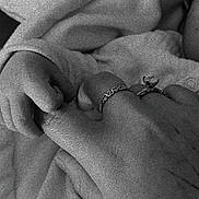 Ale is registered to the contest to win money with this photo: baby_hand, adult_hand, ring, blanket, black_and_white, close_up, skin, touch, connection, love, bond, soft, newborn, family, intimacy, fingers, wrapping, comfort, gentle, care