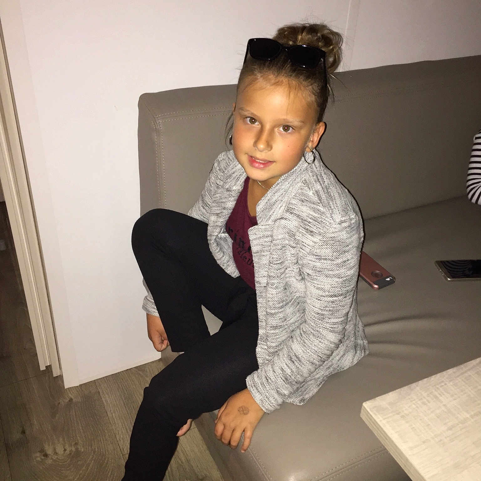 Maeline participe au concours pour gagner de l'argent avec cette photo : beauty, black, child, fashion, formal_wear, fun, girl, hairstyle, leg, outerwear, person, shoulder, sitting, smile, standing, suit, textile, top, trunk, white