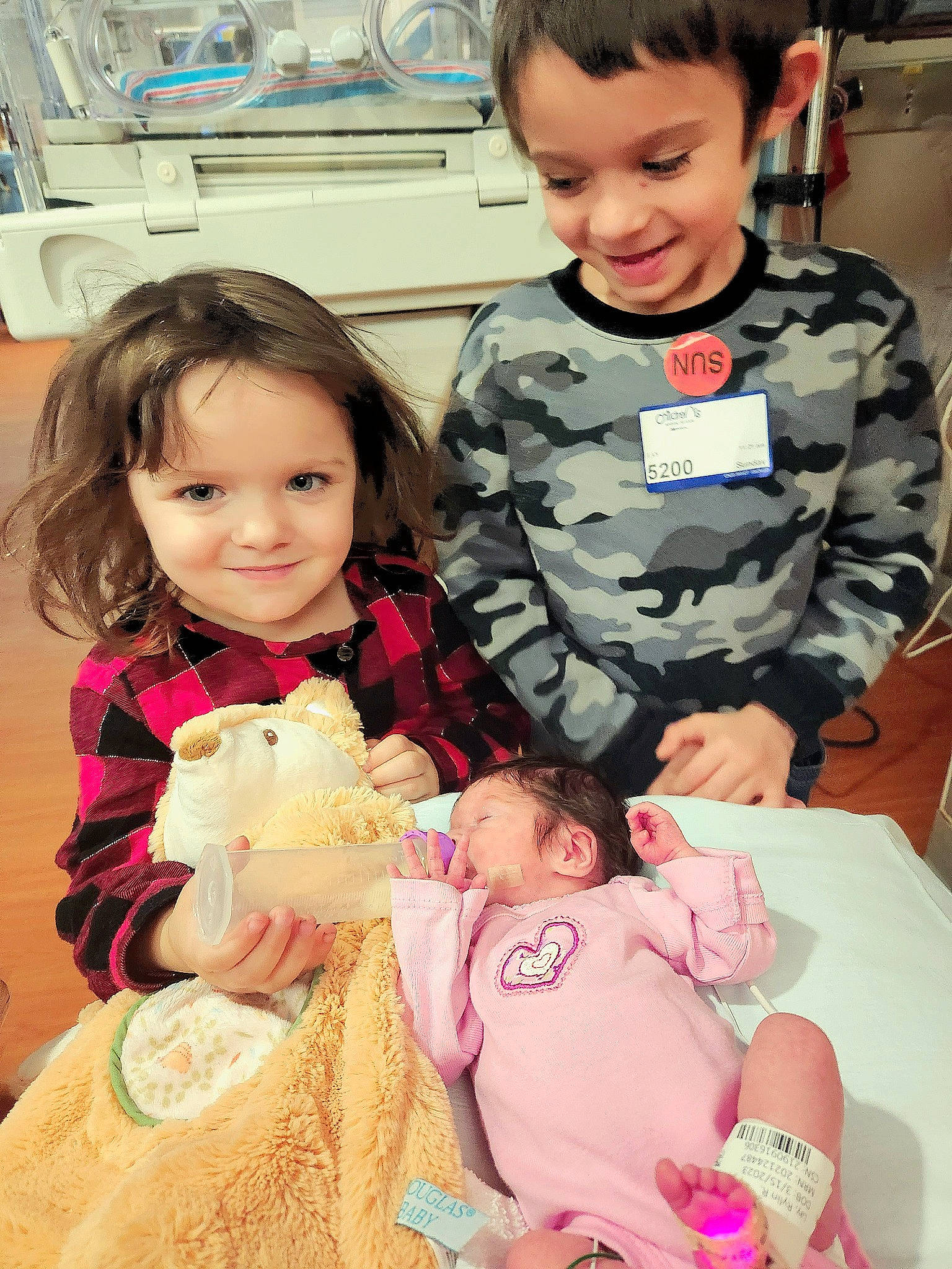 Kira is registered to the contest to win money with this photo: baby, baby_toddler_clothing, child, event, eye, face, facial_expression, fun, hairstyle, happy, head, home_appliance, joy, kitchen_appliance, organ, people, person, pink, skin, smile