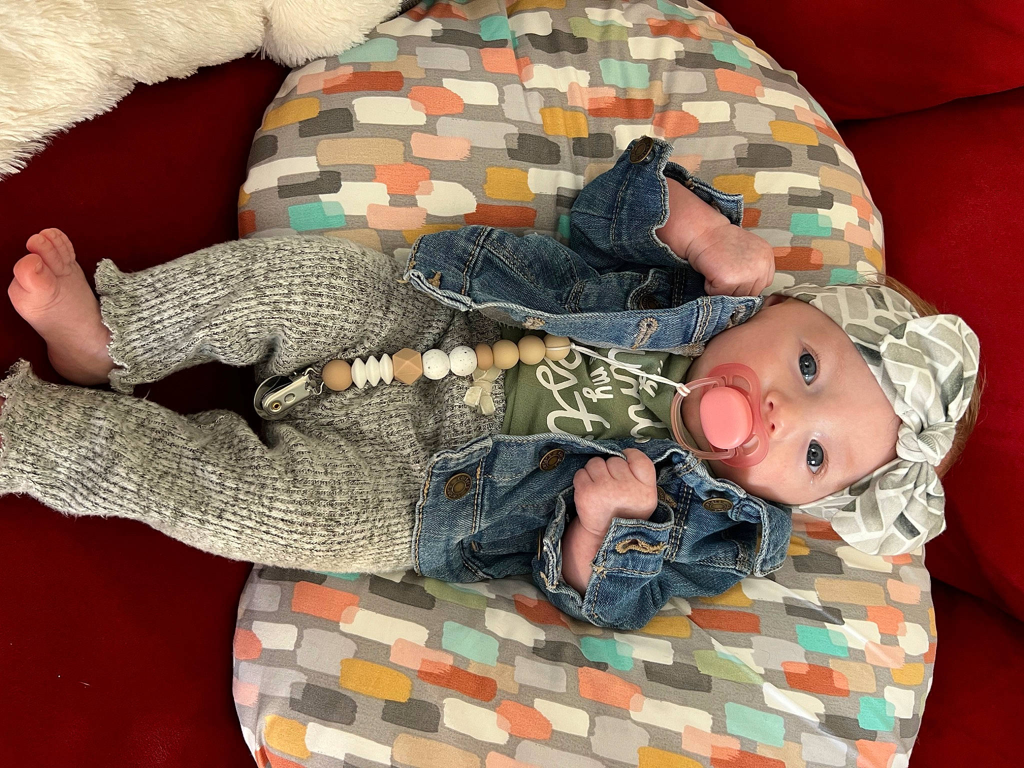 Madeleine joined the competition — help win amazing prizes! baby, baby_products, baby_sleeping, baby_toddler_clothing, child, comfort, head, headwear, lap, linens, mammal, pattern, person, room, sitting, sleeve, stuffed_toy, textile, toddler, toy