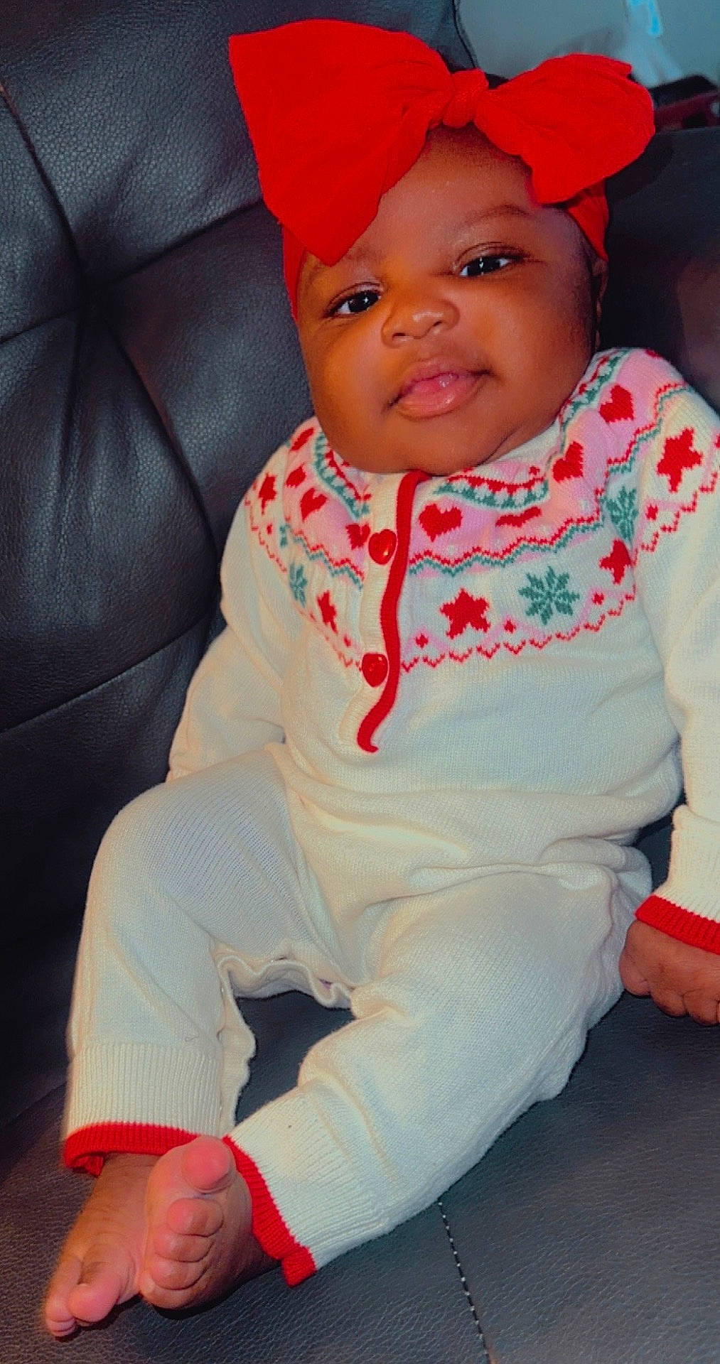 Jayla joined the competition — help win amazing prizes! baby, bodypart, cap, clothing, couch, cushion, face, finger, furniture, hand, happy, hat, head, homedecor, pants, person, photography, portrait, sitting, smile