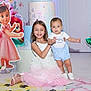 Asher is registered to the contest to win money with this photo: child, baby, girl, toddler, dress, party, birthday, cardboard_cutout, decoration, floral, backdrop, smile, shoes, posing, indoor, pastel_colors, table, sweets, celebration, photography