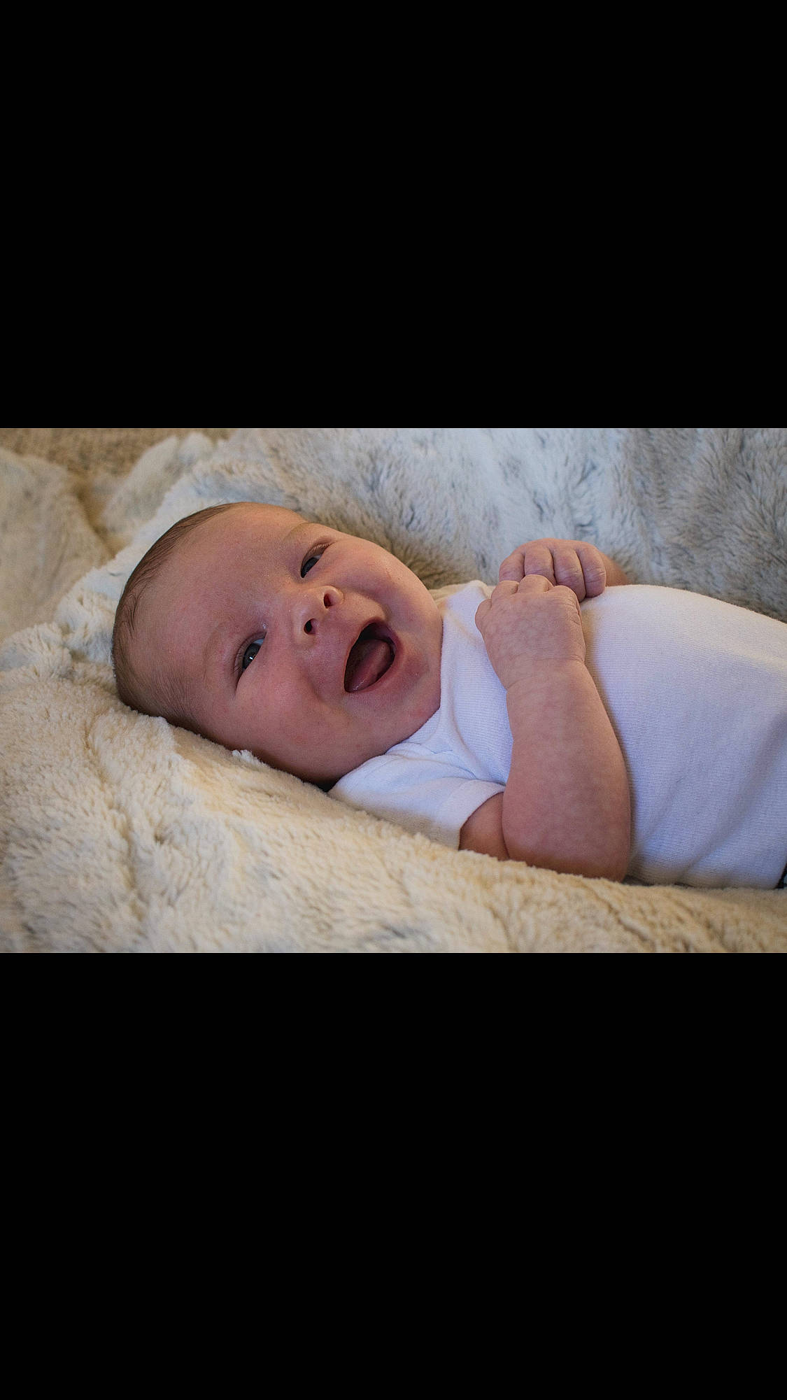 Jayce is registered to the contest to win money with this photo: baby, baby_toddler_clothing, cheek, child, comfort, fashion_accessory, flash_photography, flesh, grass, happy, laugh, linens, person, portrait_photography, sleeve, smile, toddler, wood